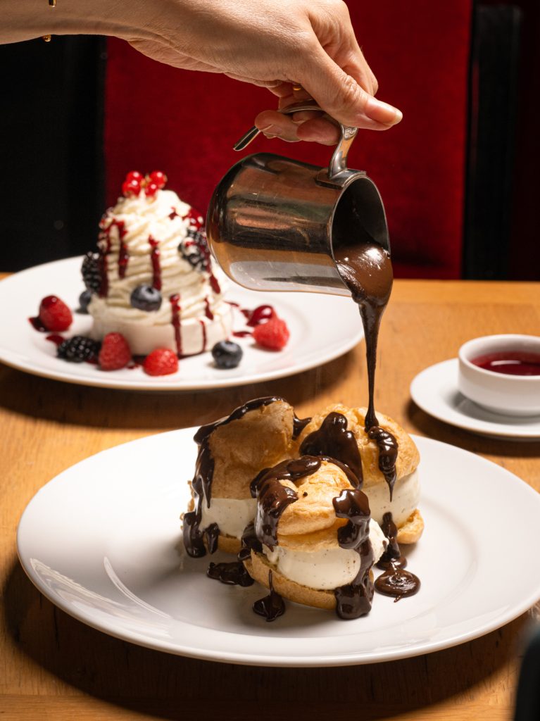 Pavlova and profiteroles french desserts